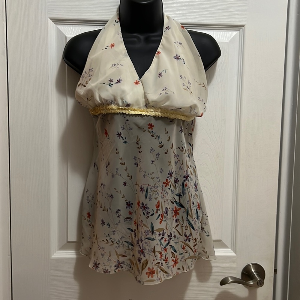 Caren sport sheer cream colored w/ multi colored flower designed halter top.